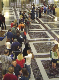 Fans wait in line for author Orson Scott Card to sign their books. [click for full-size image]
