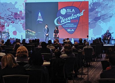 SLA president Hal Kirkwood (left) shared the big stage with SLA executive director Amy Lestition Burke during opening remarks.