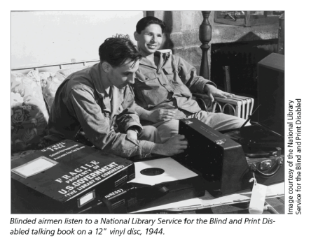 Blinded airmen listen to a National Library Service for the Blind and Print Disabled talking book on a 12-inch vinyl disc, 1944.