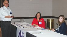 Amigos Library Services’ Keith Gaertner, Pam Carter, and Megan Bryant handled everything at the registration table.