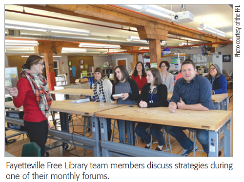 Fayetteville Free Library team members discuss strategies during one of their monthly forums.
