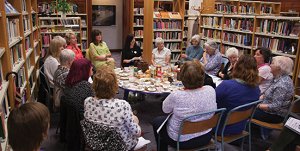 Ladies meet for tea and conversation at Glasgow Women's Library.