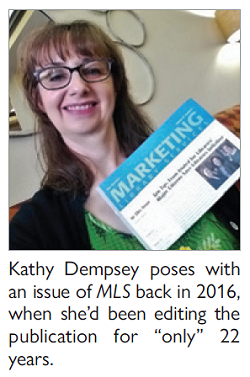 Kathy Dempsey poses with an issue of MLS back in 2016, when shed been editing the publication for only 22 years.